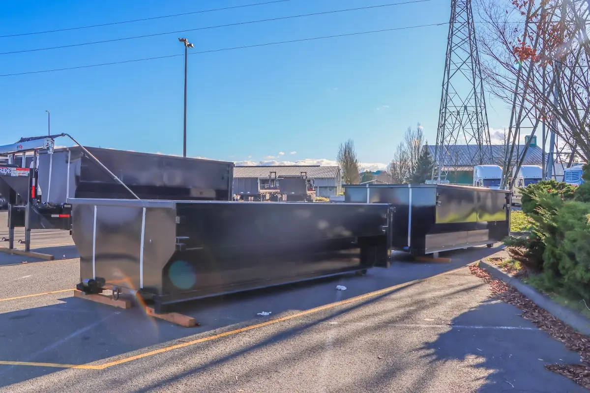 Roll-off dumpster ready for waste disposal at job site for 2 Yard Dumpster Rental in Los Alamitos